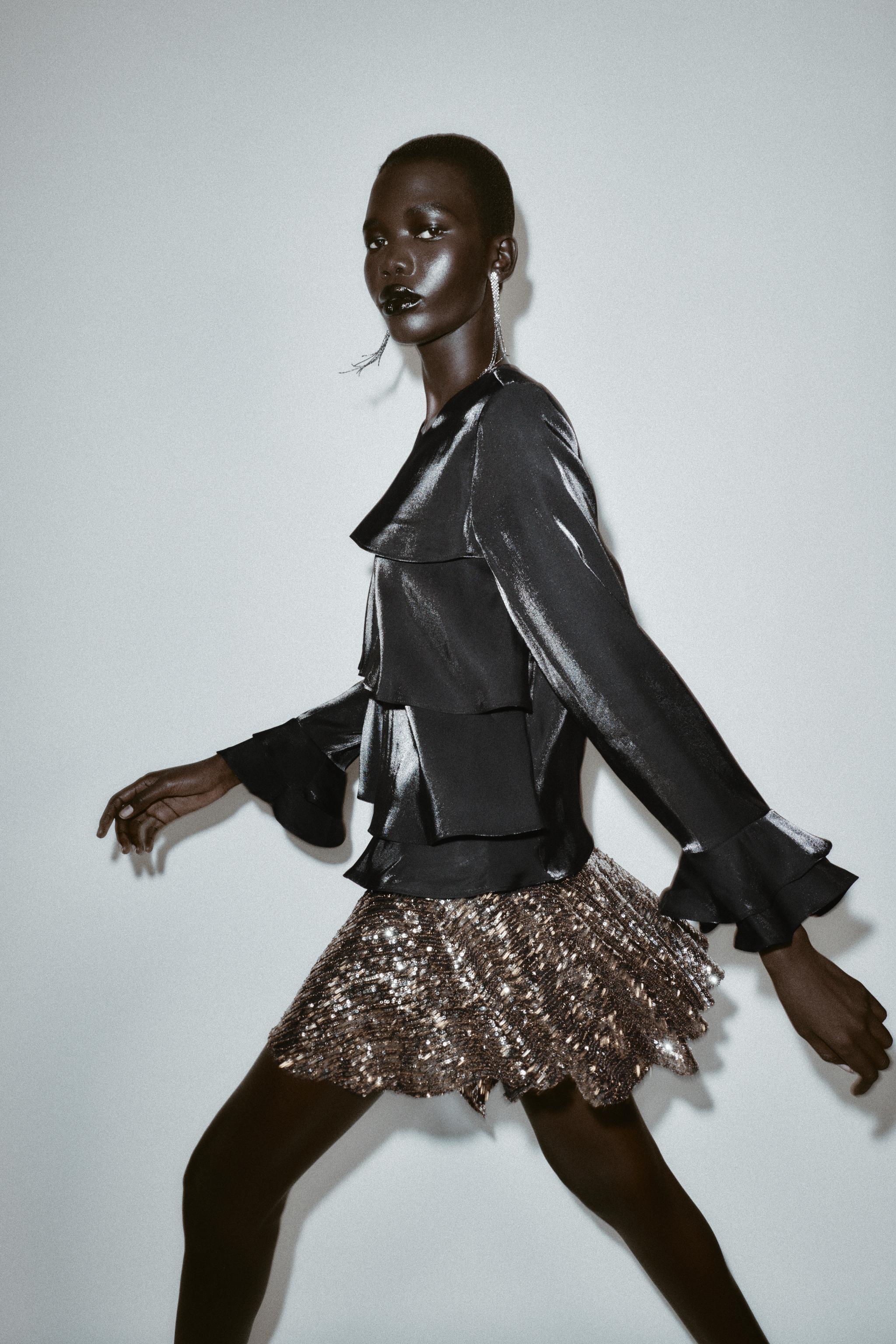 ASYMMETRIC SEQUIN SKORT